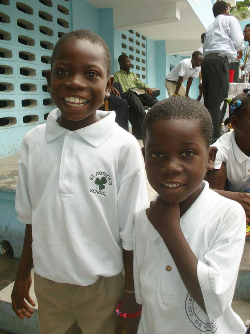 A group of young boys posing for a picture.